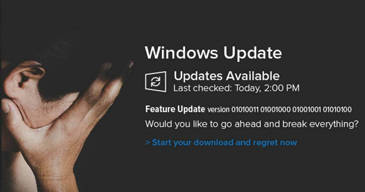 Person holding their head between their hands in despair following a Windows Update.