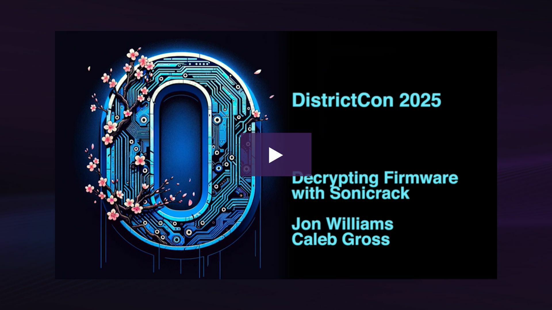 District Con 2025 Decryption Firmware with Sonicrack video logo with play button.