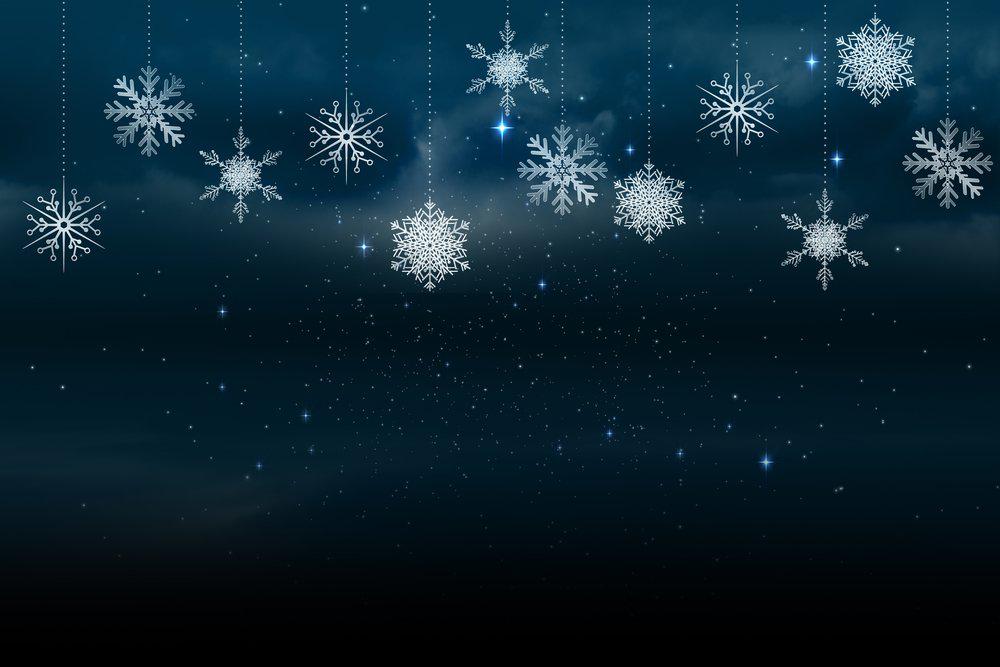 Digitally20generated20 Snowflakes20hanging20against20blue20background