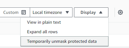 Screenshot showing the option of unmasking logs through the AWS console